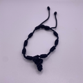 Brazalete con cruz negro