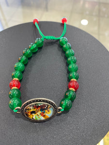 Brazalete San Miguel con Onix verde y rojo.