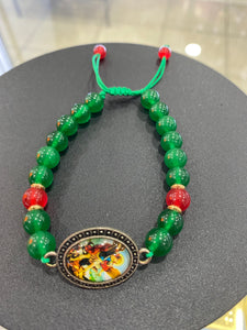 Brazalete San Miguel con Onix verde y rojo.