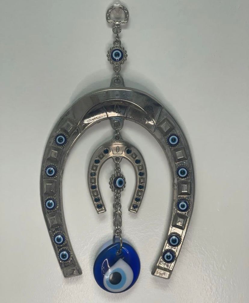 Protección con Herradura doble y Ojo Turco.